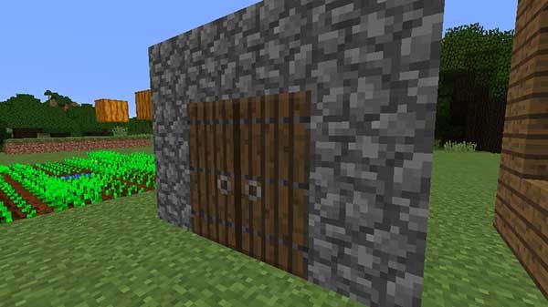 丸石とマツのドア